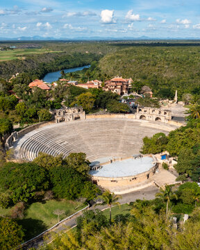 Aerial view of the Altos de Chavon Amphitheater, a historic stone open-air theater overlooking the Chavon River, surrounded by greenery in La Romana, La Romana Province, Dominican Republic.