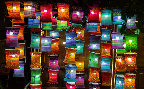 Colorful traditional fabric lanterns lighting up, Dong Van, Vietnam