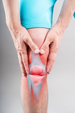 Knee pain, joint inflammation, arthritis and degenerative changes. Man suffering from leg ache and doing self-massage