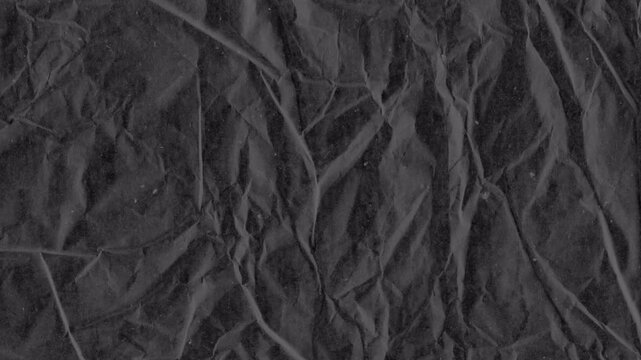 Dark Crumpled Paper Texture with Deep Wrinkles and Organic Creased Surface