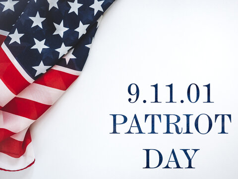 American flag on a white background. Symbolizes remembrance, patriotism, and national unity. Ideal for memorial, historical, and patriotic content	