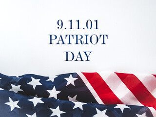 Fototapeta premium American flag on a white background. Symbolizes remembrance, patriotism, and national unity. Ideal for memorial, historical, and patriotic content 