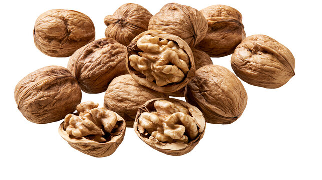 Pile of whole and cracked walnuts with kernels exposed, isolated on transparent background