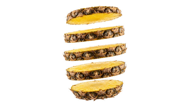 Flying fresh cut pineapple fruit slices isolated with transparent background