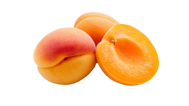 Whole and halved ripe apricots with vibrant orange flesh, isolated on transparent background