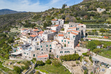 Fototapeta premium Aerial view of clustered stone houses in Verezzi, one of the most beautiful villages of Liguria region, Italy
