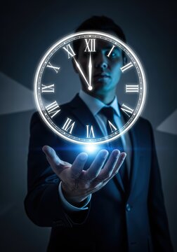 Businessman Holding Glowing Digital Clock for Time Management and Deadline Concept