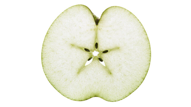 Green apple slice with star-shaped core and seeds, isolated on transparent background