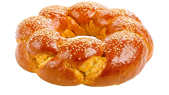 Golden brown braided challah bread with sesame seeds, isolated on transparent background