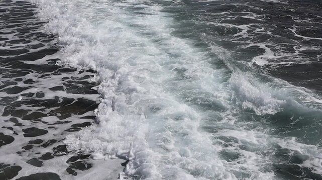 Sea foam and waves on the sea and the noise of the sea