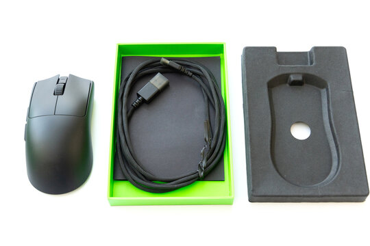 Black Computer Mouse With Box And Cable On White Background