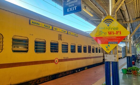 Murukkampuzha, Kerala, India &ndash; July 25, 2026: An Indian Railways passenger train halts at Murukkampuzha railway station, featuring RailTel public Wi-Fi signage, platform facilities