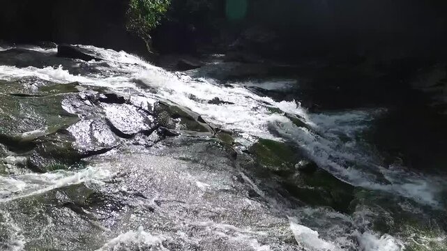 Rang Reng Cave river and waterfall in Bali, Indonesia