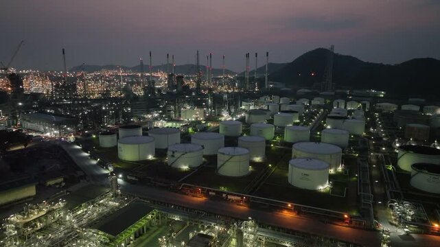 Aerial view oil and gas refinery petrochemical storage tank and pipeline steel, Oil and gas transportation system pipeline steel at oil and gas refinery industry chemical plant, Pipeline oil and gas.