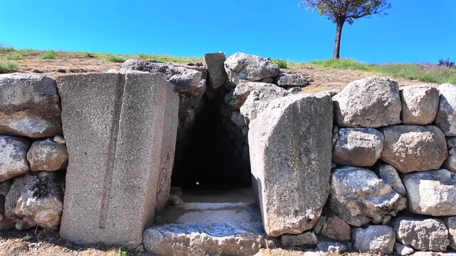 The exterior exit portal of the famous Yerkapı postern tunnel emerges beneath stone walls at ancient Hattusa, Turkey.