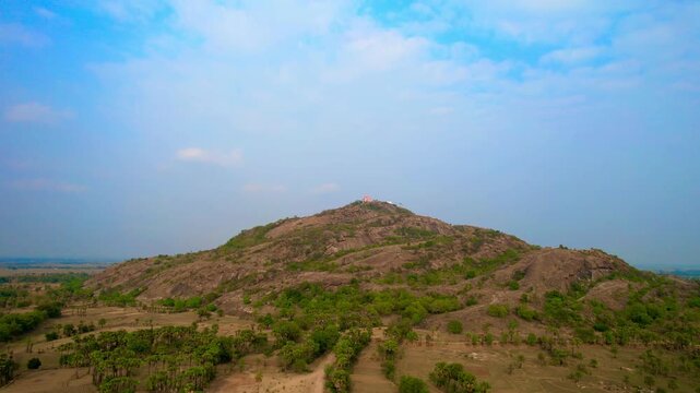 Aerial drone footage of Mandar Parvat in Banka, Bihar, showcasing the sacred hill, lush green landscape, surrounding countryside and historic pilgrimage site linked to Samudra Manthan.
