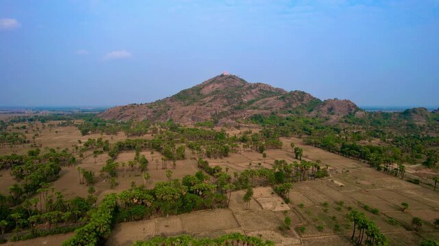 Aerial drone footage of Mandar Parvat in Banka, Bihar, showcasing the sacred hill, lush green landscape, surrounding countryside and historic pilgrimage site linked to Samudra Manthan.
