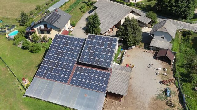 Aerial  view of a modern private farm powered by solar energy panels