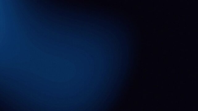Smooth Blue Yellow Light Leak Animation with Warm Film Burn Glow and Cinematic Optical Lighting Effect on Dark Background for Video Overlay and Transition