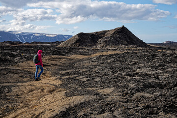 Hiking Across a Volcanic Lava Field in Iceland © MarekLuthardt
