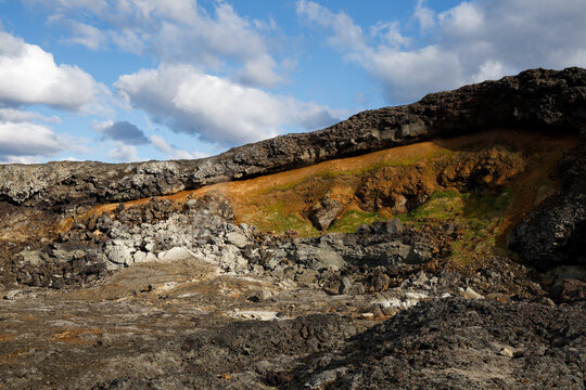 Colorful Volcanic Terrain and Geothermal Steam