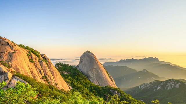 4K Time Lapse Video (Zoom In) of Sunrise at Bukhansan Mountain and Morning Sky with Beautiful Sea of Clouds at Bukhansan National Park, Seoul, South Korea.