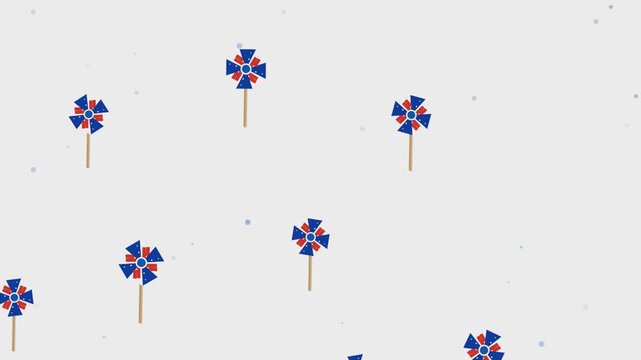 Spinning colorful pinwheel toys floating in motion within this bright digital graphic animation background loop footage