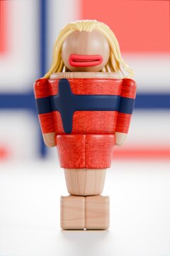 stylised norwegian soccer foosball player with blonde hair, foosball figurine