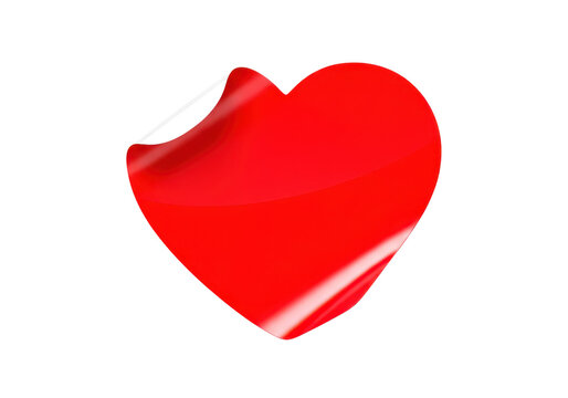Red heart shaped sticker with peeling corner on transparent checkered background.
