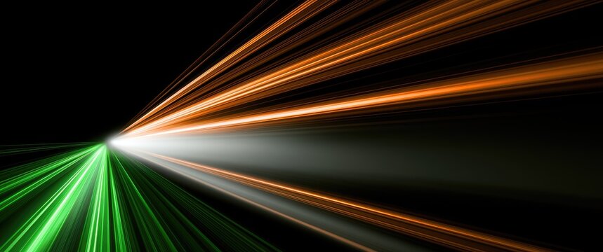 Abstract light streaks in green, white, and orange against a black background, symbolizing speed and motion.
