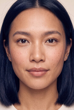 Closeup natural beauty portrait of a woman with clear skin and freckles for skincare and wellness branding use