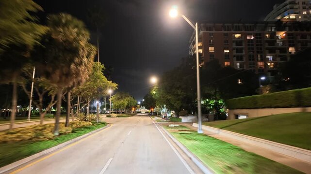 Driving through Coconut Grove miami Florida at night