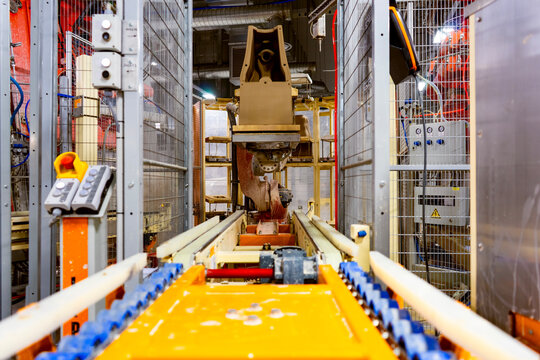 Large-scale factory robotic arm assembly line