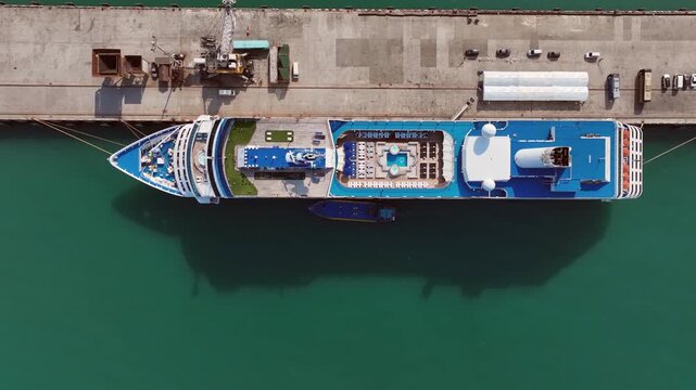 Aerial view luxury ocean cruise ship on clam blue sea, Elegant modern travel lifestyle, Luxury cruise ship liner modern maritime business ocean tourism, Global business cruise ship liner industry.