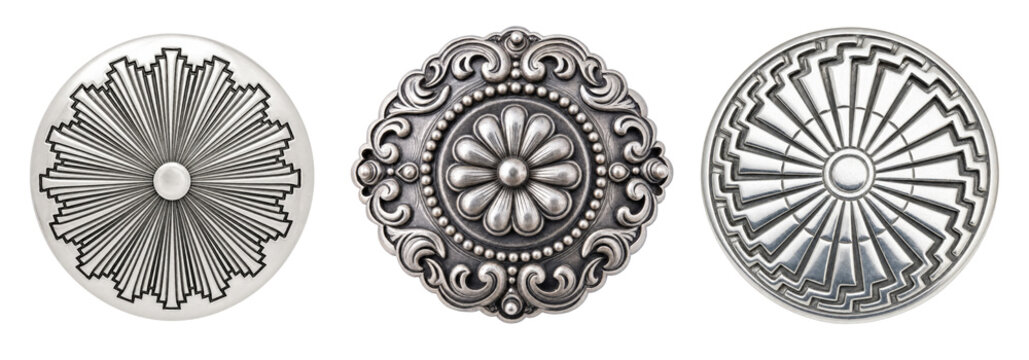 Three different styled silver conchos with intricate designs and floral patterns.