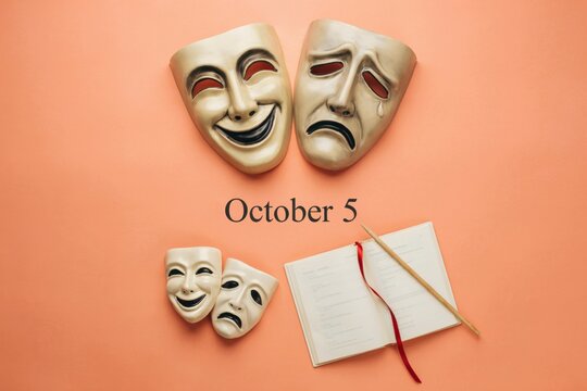 Comedy and tragedy theater masks with notebook on peach background for October 5 calendar date