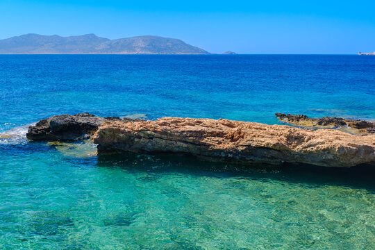 Rocky coastline with Aegean Sea, Koufonisi, Cyclades, Greece