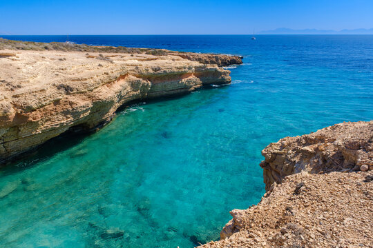 Rocky coastline with Aegean Sea, Koufonisi, Cyclades, Greece