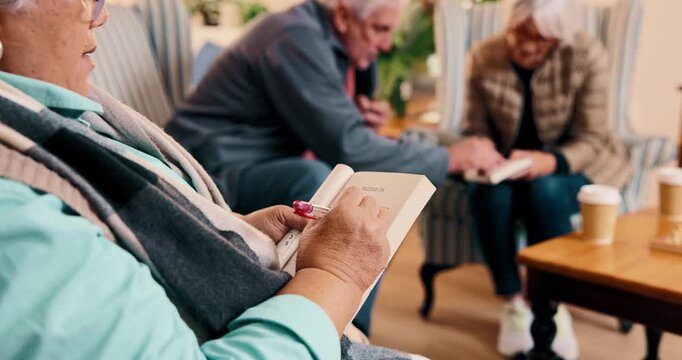 Book, puzzle and senior people in nursing home with game, sudoku and activity for brain teaser. Retirement, pen and elderly person with answer, numbers challenge and writing for mental stimulation