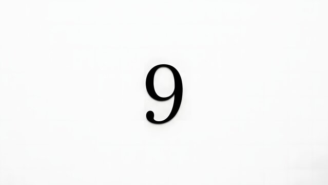 Minimalist number nine on white background, elegant black serif numeral 9, clean typography for counting and sequence