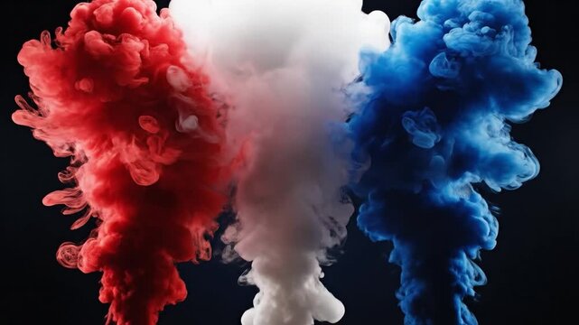 Red white and blue ink clouds expanding and mixing against a dark backdrop for patriotic themes