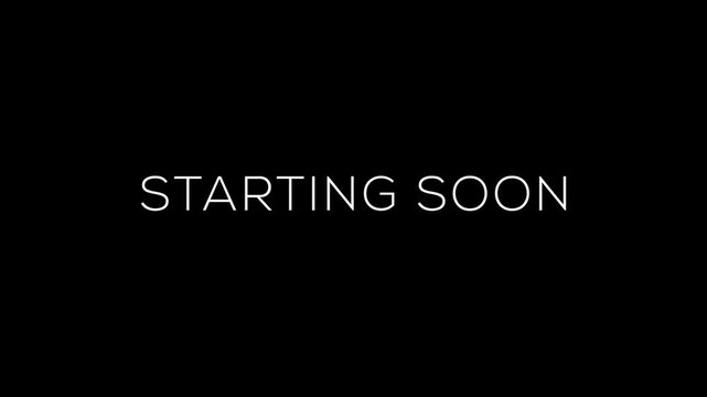Text animation starting soon with blurring text on a black isolated background. 4K