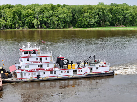 Savana, Illinois May 12, 2026 Thomas E. Erickson Tugboat Pushing Barges South down the Mississippi River Inland Waterway