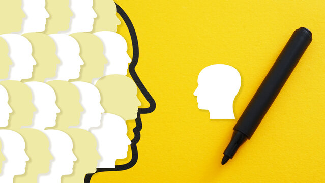 Collective Thinking and Individual Identity Concept with Human Head Silhouettes Representing Social Influence Independent Mindset Critical Thinking Creativity and Personal Perspective