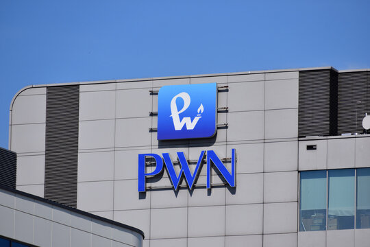 PWN Polish Scientific Publishers logo, signage on the facade of th book publisher office. WARSAW, POLAND - APRIL 18, 2026