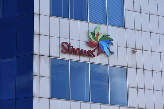 Strauss Group, Israeli food and beverage company, office facade with signage, logo, emblem. WARSAW, POLAND - APRIL 18, 2026