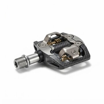 Close-up of modern clipless bicycle pedal mechanism. High-performance road bike SPD pedal with durable metal construction and adjustable tension.