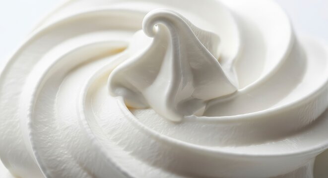 Macro View of a Smooth White Whipped Cream Swirl Texture