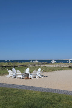 Sailboats on Calm Water Near Grassy Shoreline in Chatham, Cape Cod