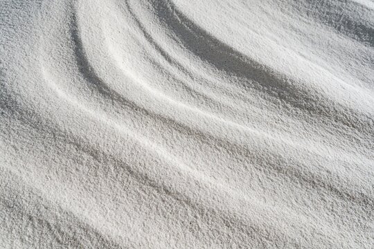 Abstract Sand Texture with Wavy Patterns and Subtle Light Play